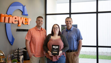 Amanda Depew accepts award