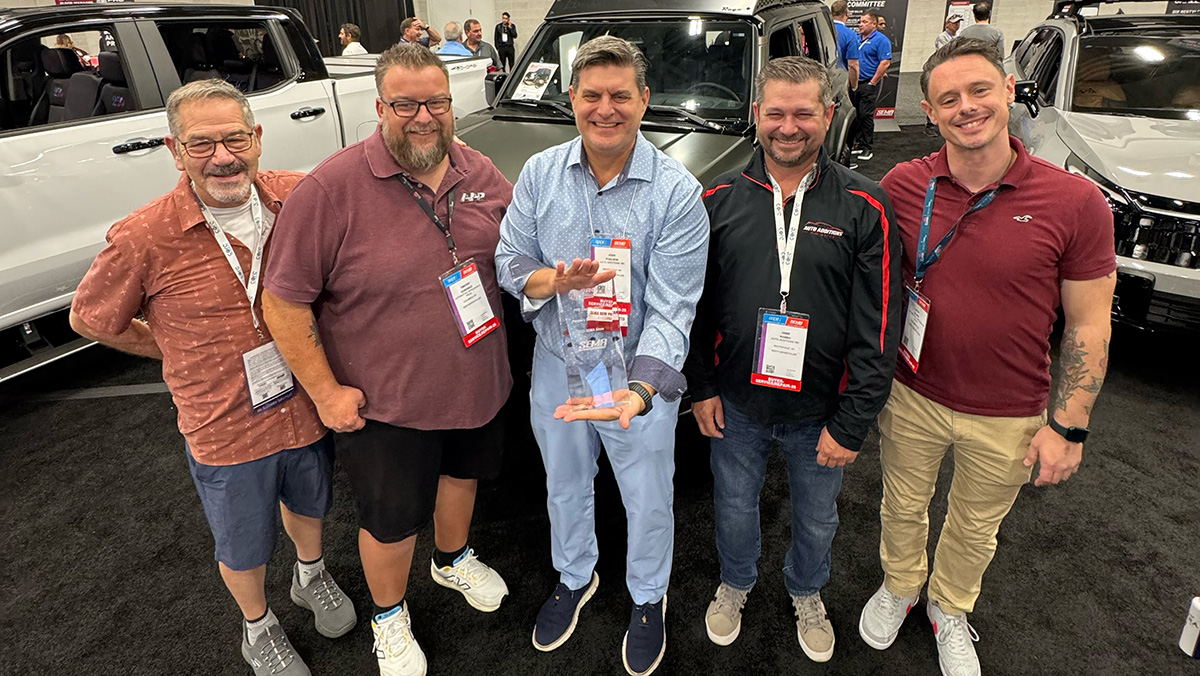 The Automotive Concepts team holding trophy