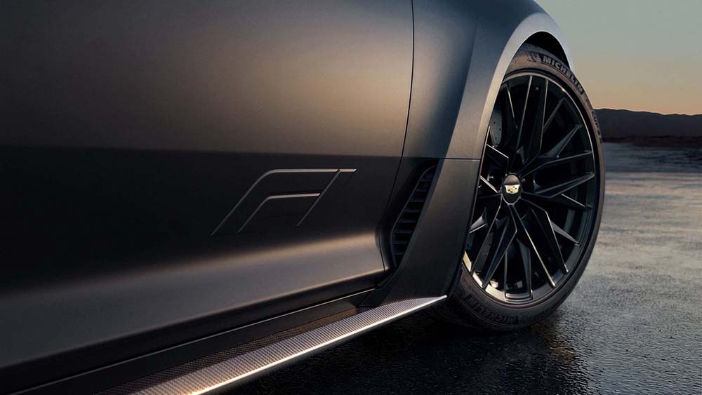 Closeup of 2026 Cadillac CT5 Blackwing F1 showing F1 logo near front passenger side tire