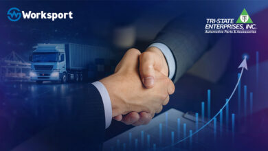 Closeup of shaking hands with Worksport and Tri-State Enterprises logos