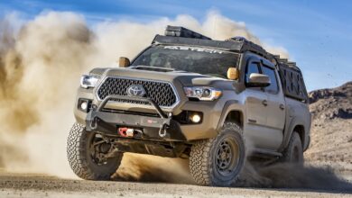 lifts & leveling kits fabtech toyota turning in the sand