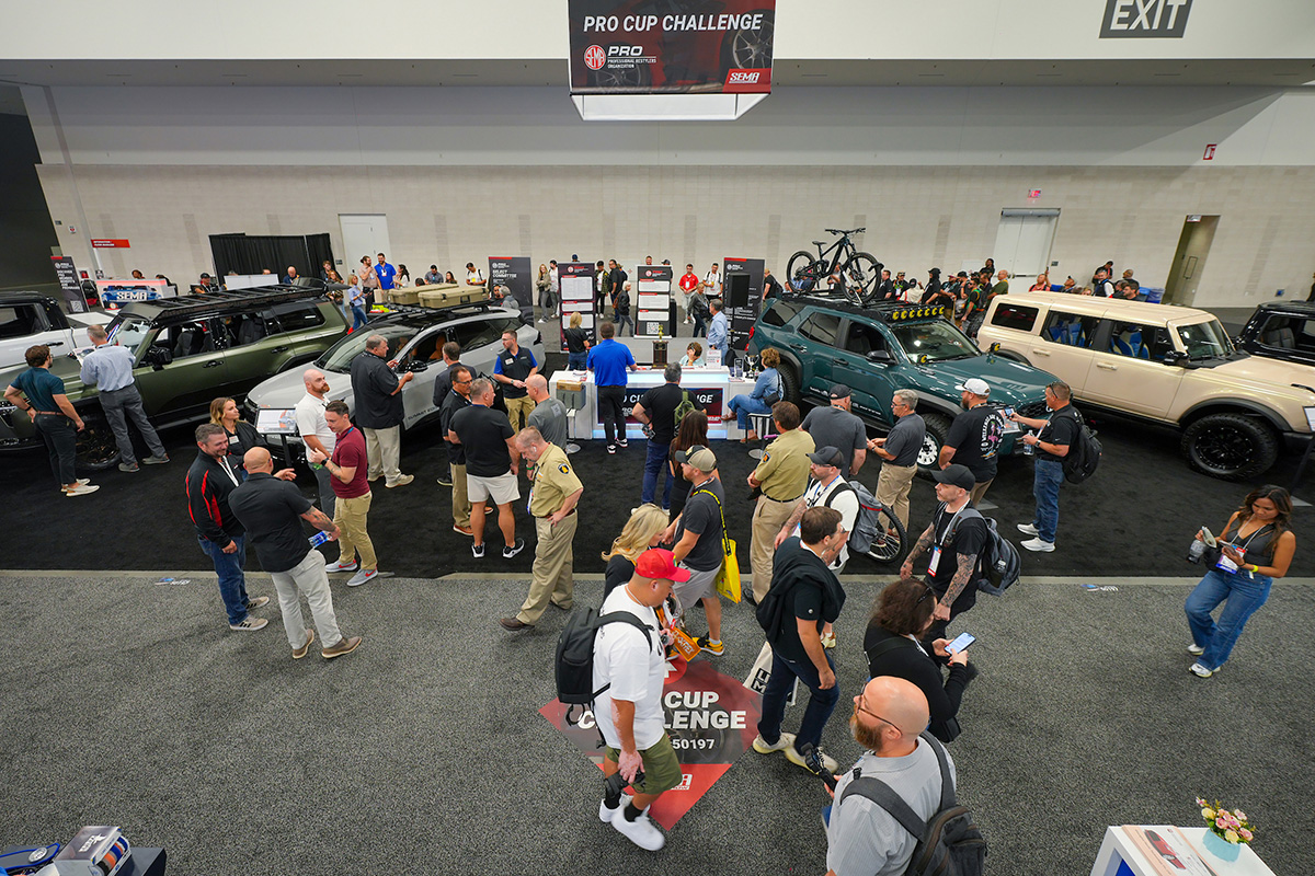 People viewing vehicle builds at Pro Cup Challenge