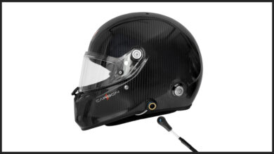 Racing helmet with hydration hose