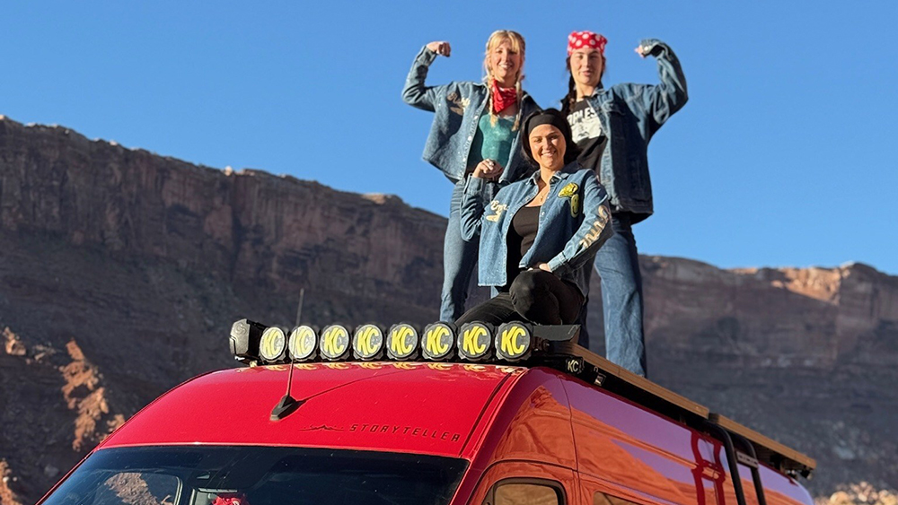 JCF Scholarship Recipients standing on top of STORYTELLER OVERLORD BEAST MODE van