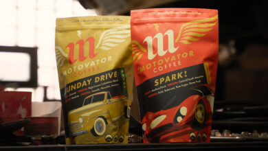 Two bags of Motovator Coffe on workbench in garage