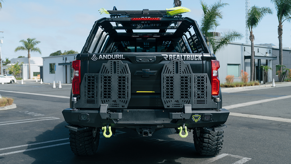 A custom military utilitarian Chevy 1500 Silverado build rear view