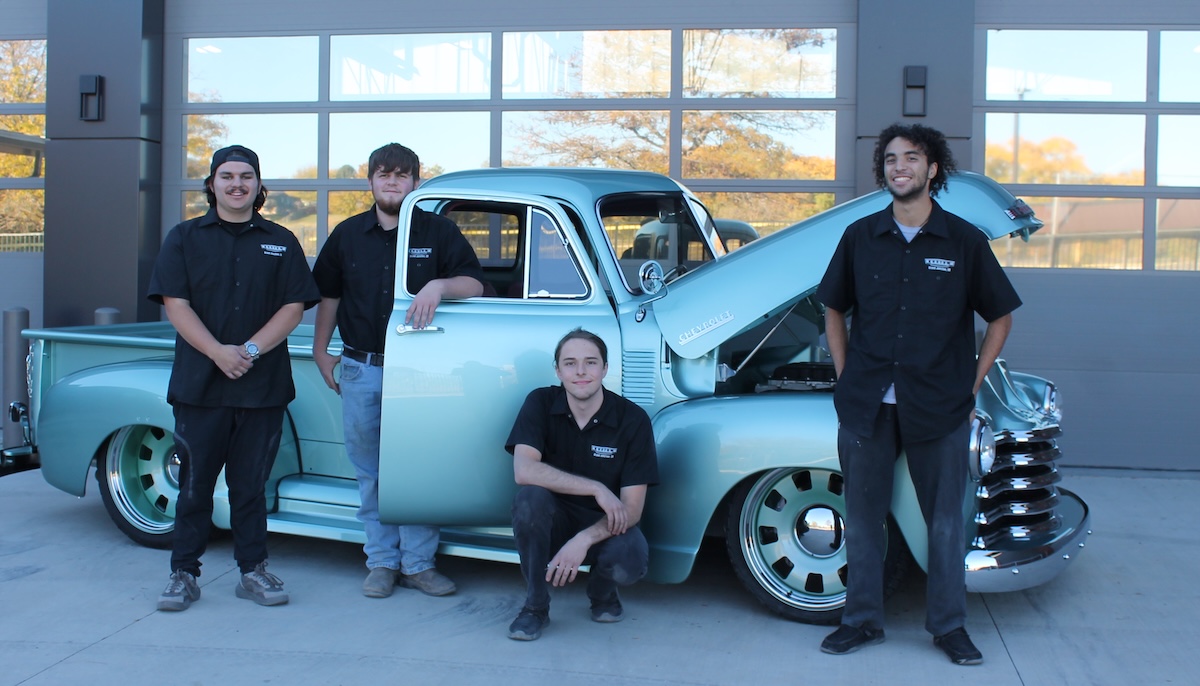 acme chop shop student workshop participants in front of truck