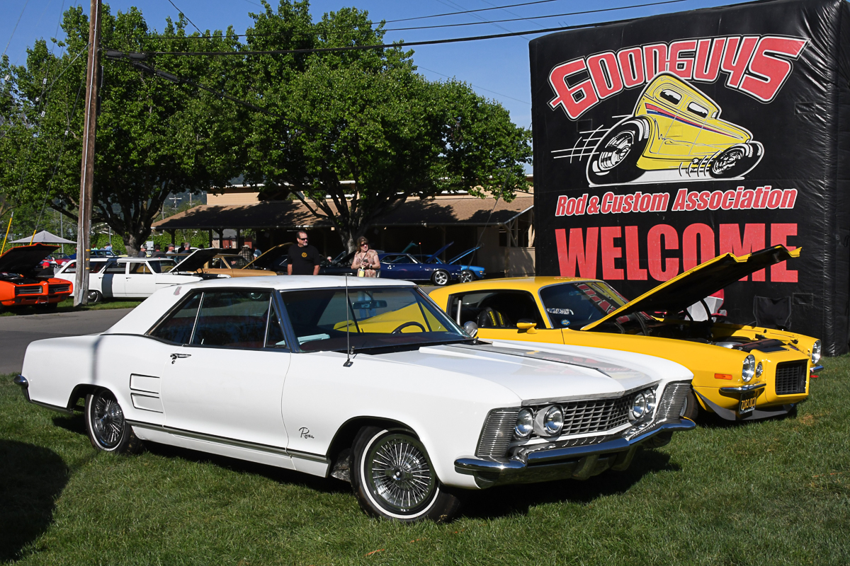 Goodguys sign next to classic cars