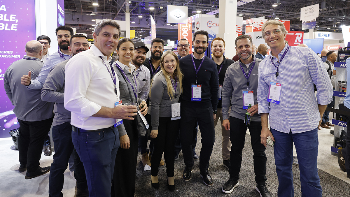 Group photo on the AAPEX show floor