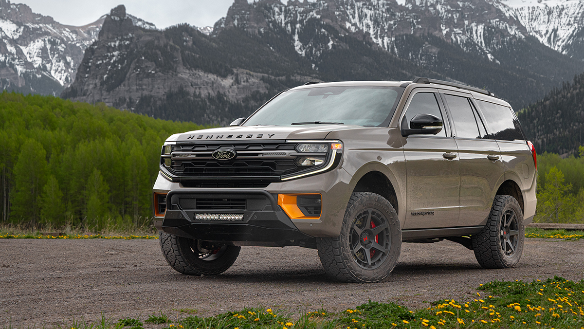 Hennessey Ford Expedition Tremor VelociRaptor SUV front three-quarter view with mountains in background