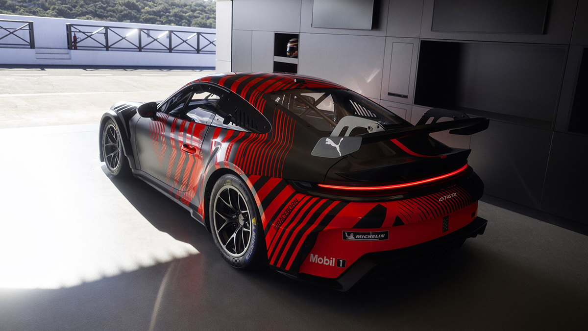 Porsche 911 GT4 R parked in garage