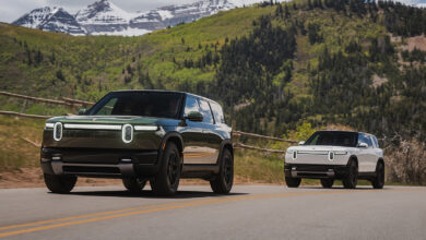 Two Rivian R2s on road
