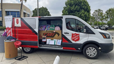 Salvation Army van filled with backpacks