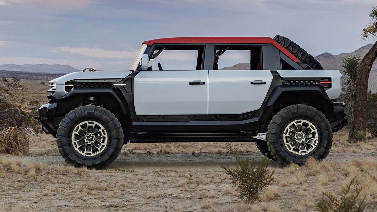 Side View GMC HUMMER HX SUV parked in desert