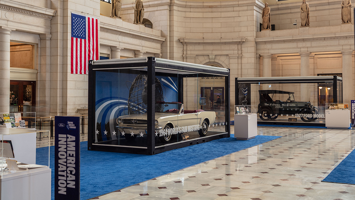 1965 Ford Mustang convertible encased in glass display