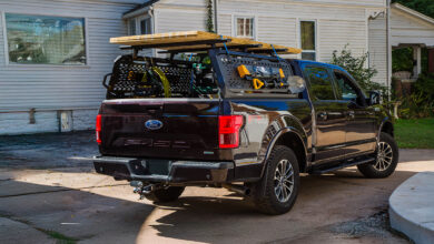 Truck with Kuat accessories parked in front of house