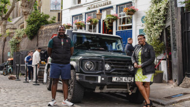 Codriver/navigator Bonnie Koko (left) & Becky Kim standing in front of INEOS Grenadier