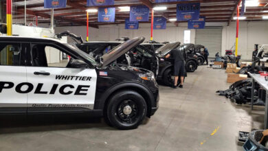 Dana Safety Supply shop with Police SUVs