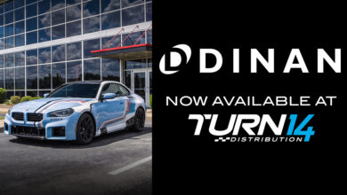Dinan and Turn 14 Distribution logos next to BMW
