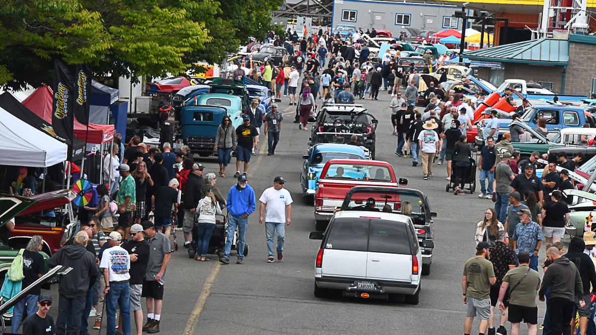 Goodguys Pacific Northwest Nationals peolp, cars and vendors in the street