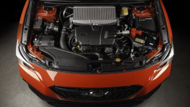 Import Performance cobb tuning red car engine overhead shot