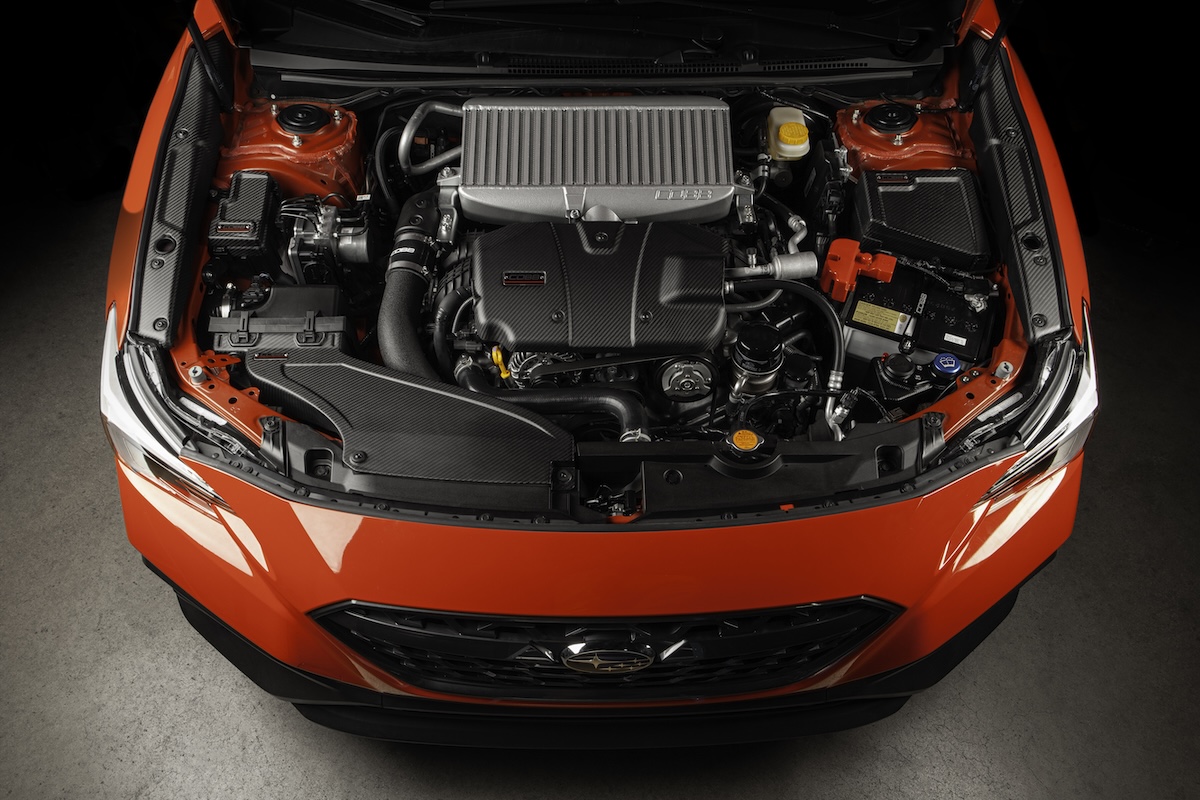Import Performance cobb tuning red car engine overhead shot