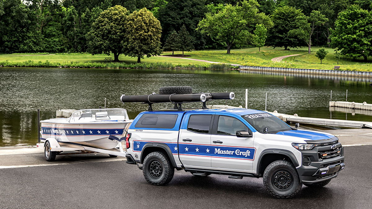 1975 “Stars & Stripes” ski boat towed by custom Chevrolet Colorado