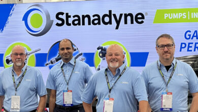 Stanadyne employees at show booth
