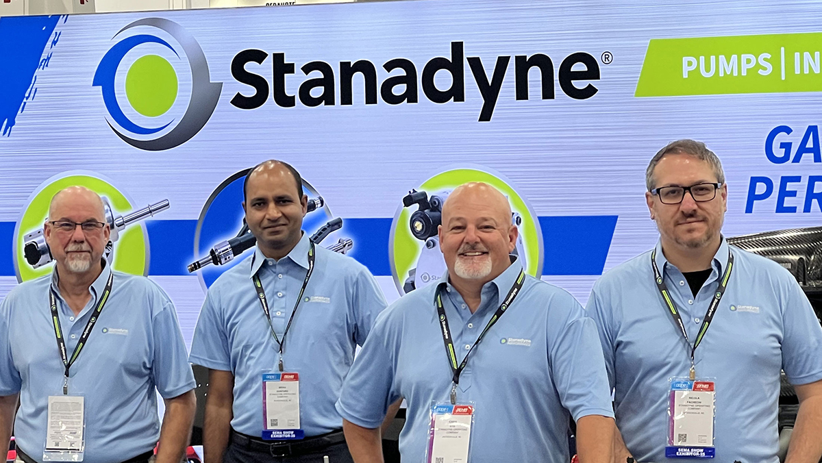 Stanadyne employees at show booth