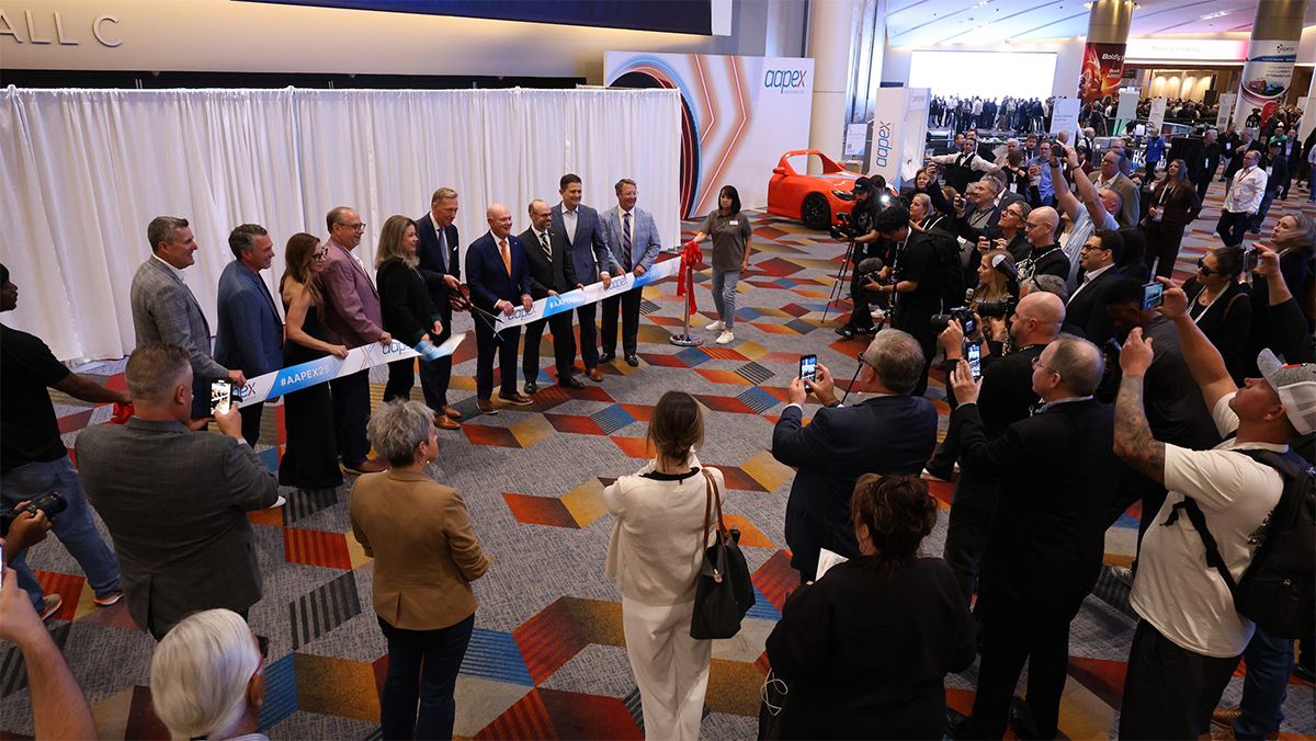 aapex ribbon cutting