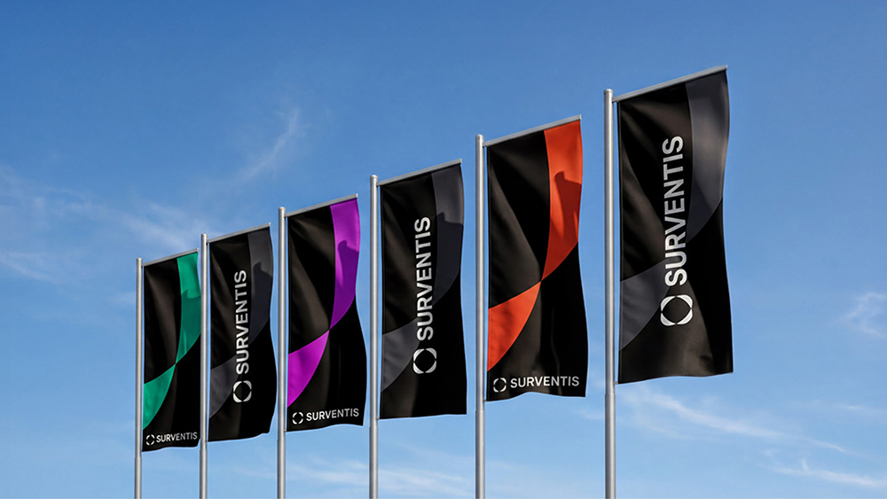 Row of Surventis branded flags