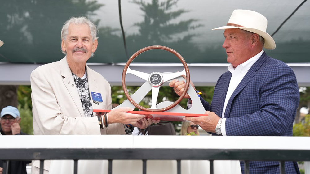 Prof. Gordon Murray CBE accepting award at Pebble Beach