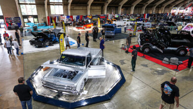 Inside aerial view of Grand National Truck Show with trucks and people