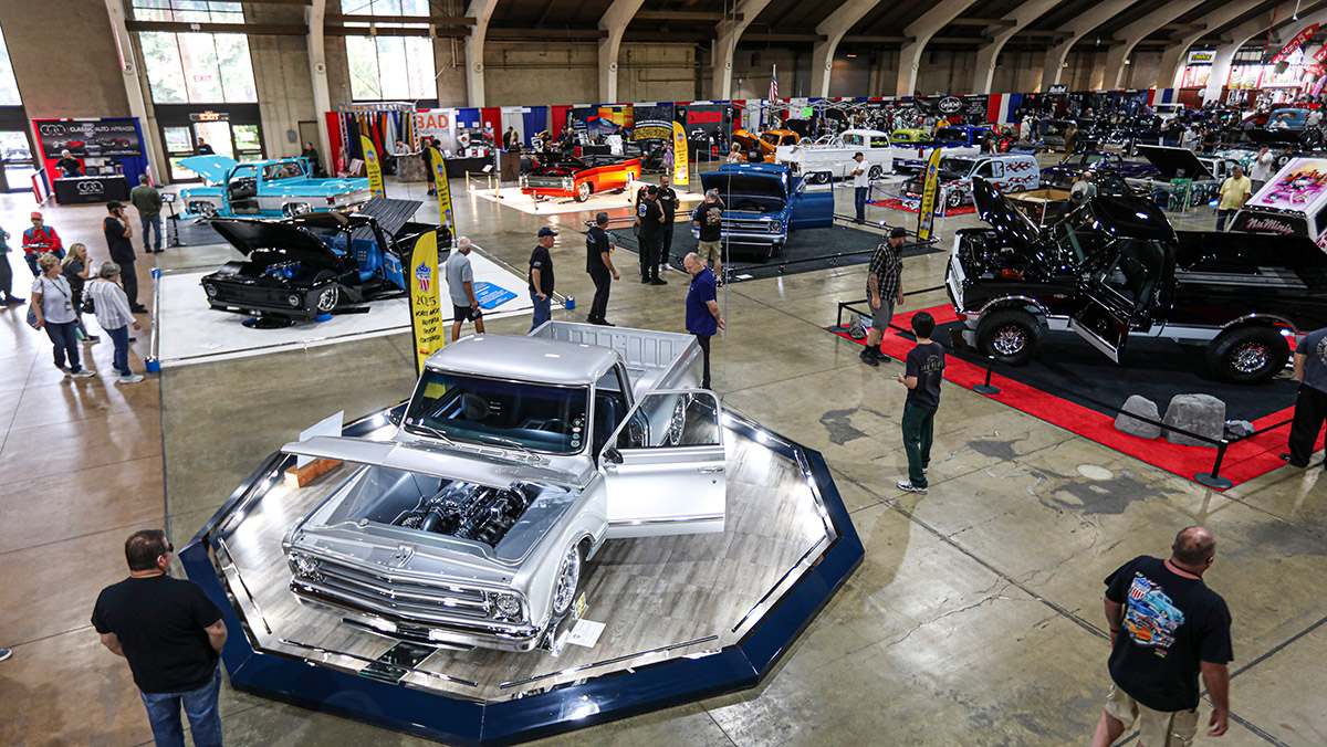 Inside aerial view of Grand National Truck Show with trucks and people