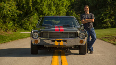 Bill Tichenor standing next to car