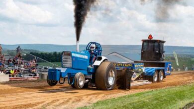 diesel motorsports blue tractor competes in sled pulling event