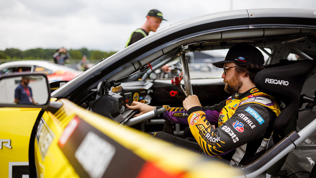 Driver sitting in race car