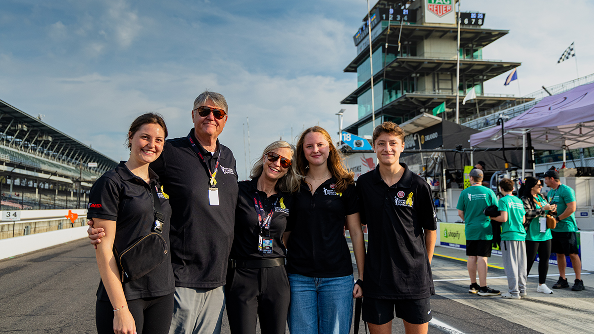 Jim and family at racetrack
