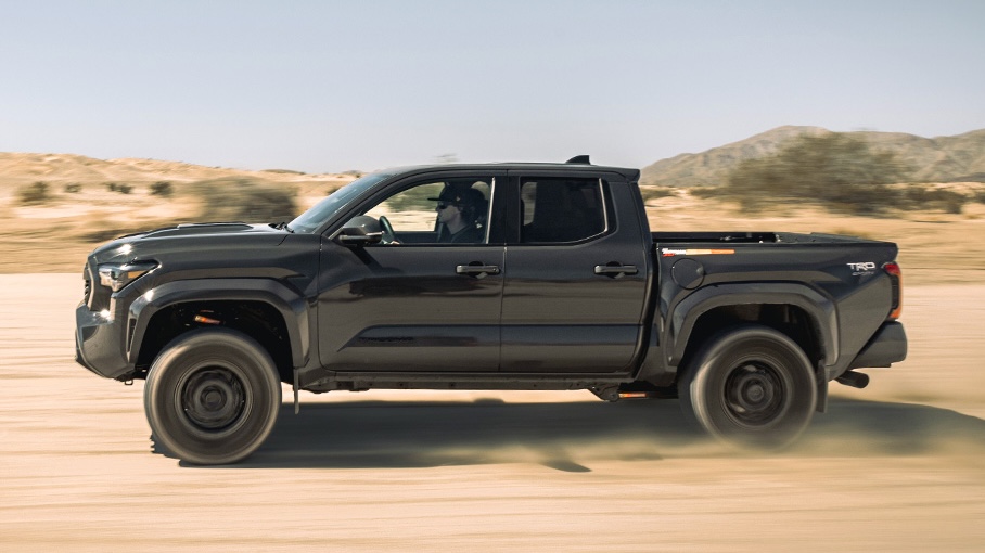 lifts and leveling kits camburg-equipped dark truck in sand