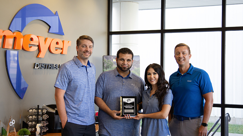 Edward Paz receiving 2026 Q2 Sales Performance Award