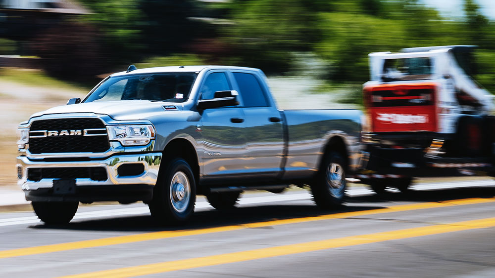 Ram 3500 towing Bobcat