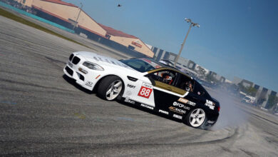 Race car drifting on racetrack