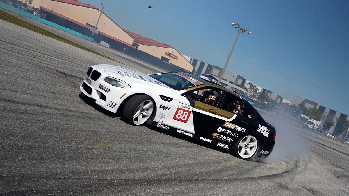 Race car drifting on racetrack