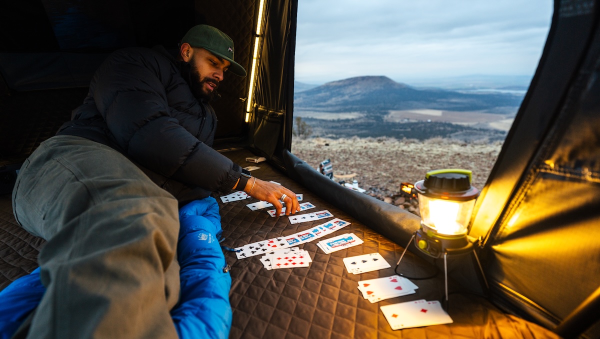 rooftop tents yakima man inside playing cards