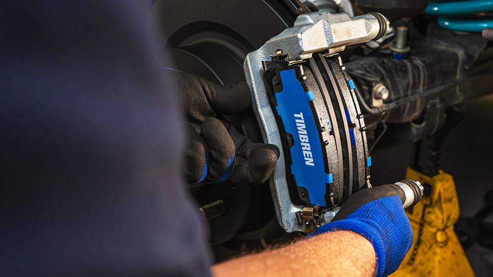 Tech installing Tembren brakes