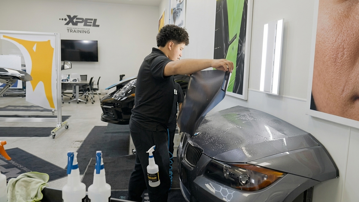 Unique Academy Student learning to wrap