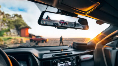 Interior of truck focusing rearview mirror