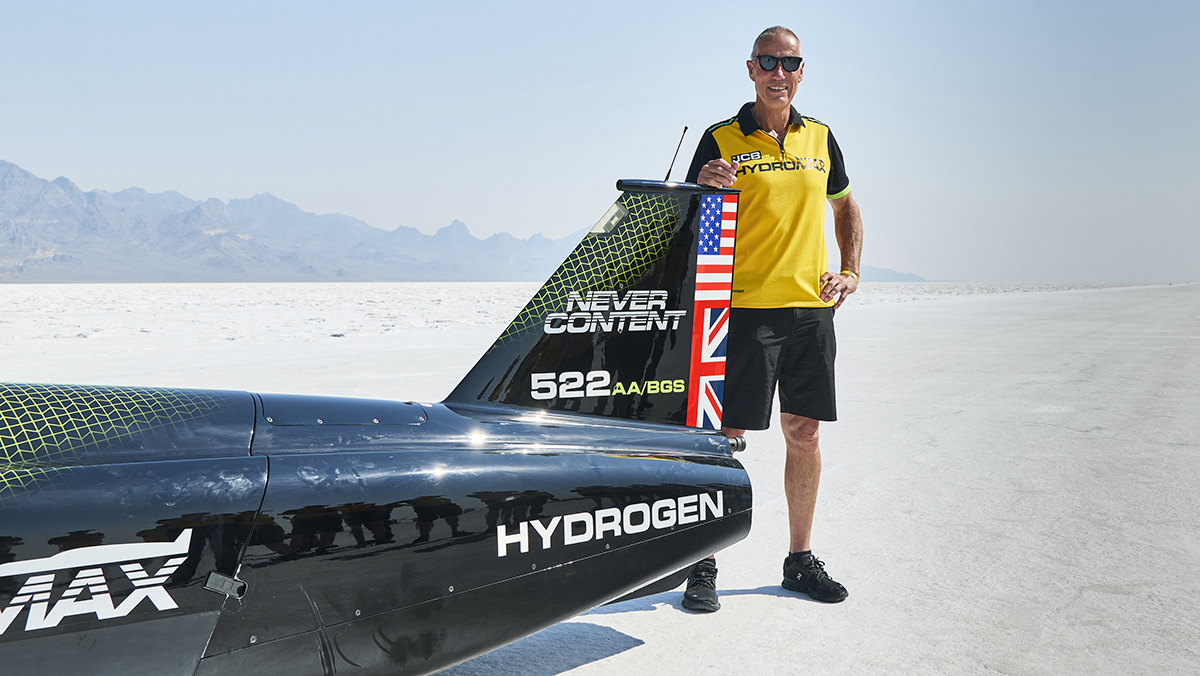 Andy Green standing behind JCB Hydromax