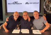 Executives from AM Group and AC Schnitzer sitting at table