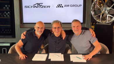 Executives from AM Group and AC Schnitzer sitting at table